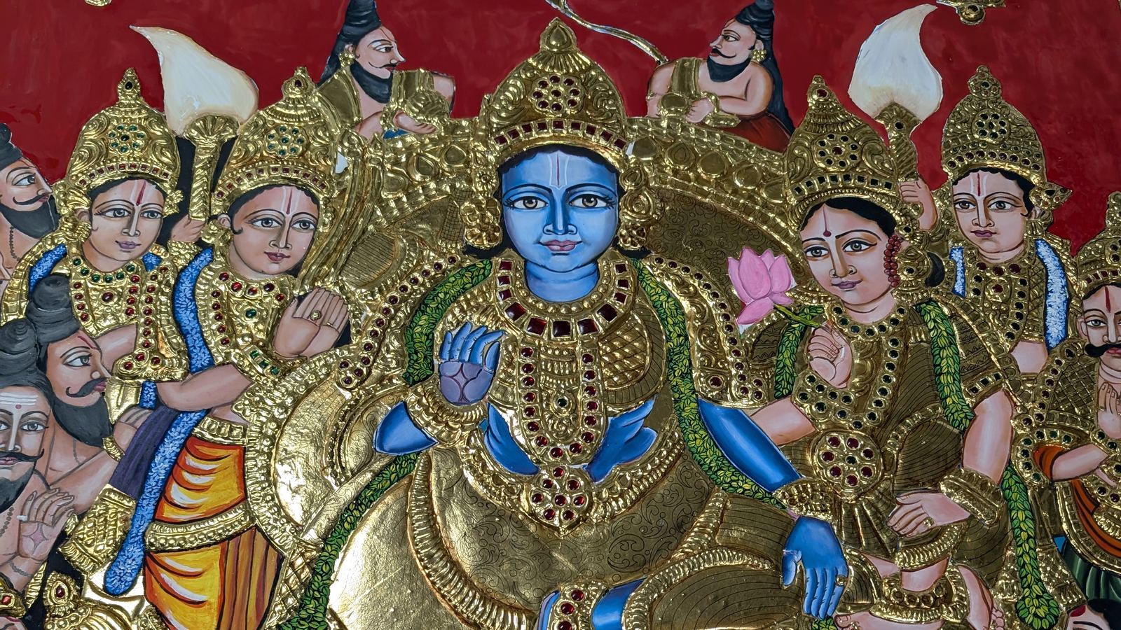 Close-up of Anu's Ramar Pattabishegam Tanjore painting, with Rama in 22-carat gold relief