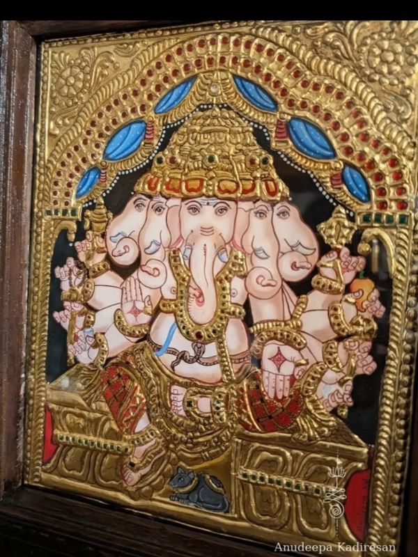 Tanjore painting of Panchamukha Ganapati, the five-faced form of Ganesha, in raised gold work with red and blue stones