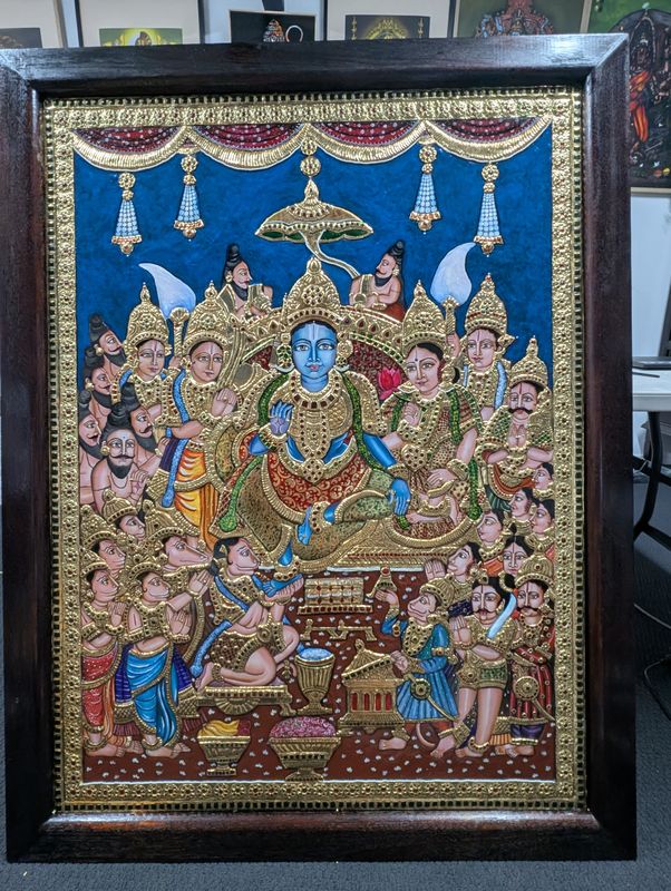Framed Tanjore painting of Rama's coronation with many figures in gold relief